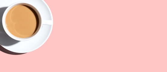 A cup of coffee overhead view on desk - flat lay