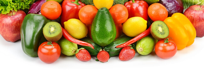 Fruits and vegetables isolated on white . Wide photo.