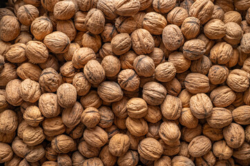 Walnuts, view of a large number of nuts, top down view.
