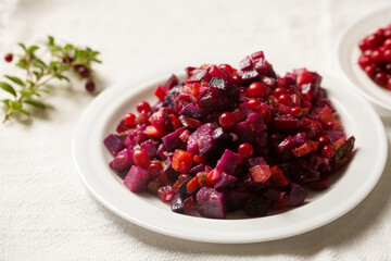 Vinaigrette salad with purple potatoes and lingonberries