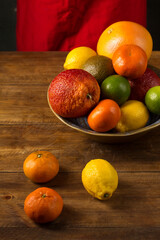 Fototapeta na wymiar A variety of exotic citrus fruits in a large bowl