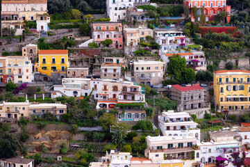 Fototapeta na wymiar Touristic Town, Positano, on Rocky Cliffs and Mountain Landscape by the Tyrrhenian Sea. Amalfi Coast, Italy.
