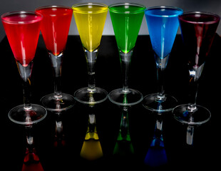 Dark black background with color glass shots