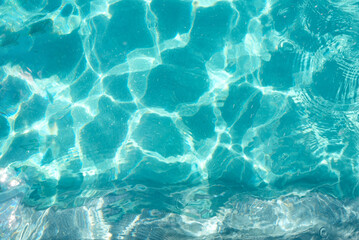 Abstract blue texture of swimming pool water