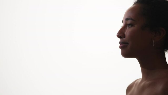 Shifting feelings. Profile woman. Advertising background. Upset lady changing emotion to positive looking forward posing white copy space.