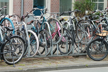 Fototapeta na wymiar bikes in street Amsterdam