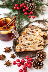 Still life with tasty cake portion. Christmas stollen with several ingredients