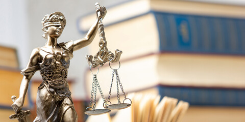 Law and justice concept. Mallet gavel of the judge, scales of justice, books. Copy space for text