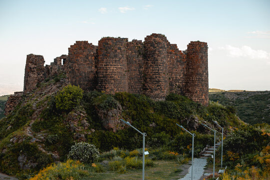 ancient partially destroyed stone fortress with round towers Amberd in Armenia at the foot of Mount Aragats