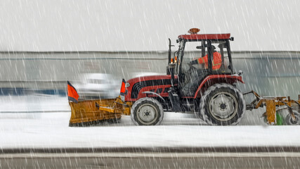 Blurred image of a snowplow