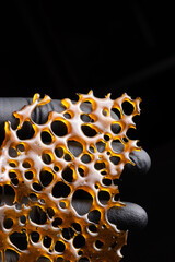 Gloved Hand Examines Cannabis Extract