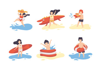 Little Boy and Girl Having Vacation at Sea Splashing in Water and Having Fun Vector Set
