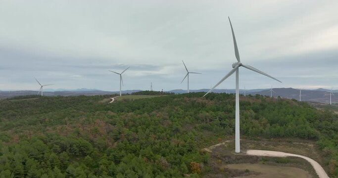 Wind generators turbines and wind farm mills. Wind power plant. Conesa, Tarragona Catalonia Spain. 4K 50fps