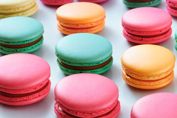 Fototapeta na wymiar a lot of macaron with different color on white background