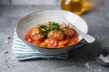 Meatballs with vegetables and tomato sauce