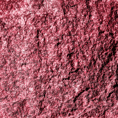 Stone texture closeup background. Volcanic Rock Texture. Viva Magenta