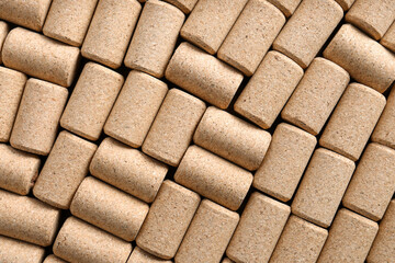 Many corks of wine bottles as background, top view