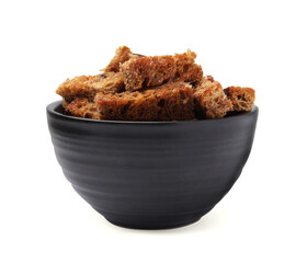 Bowl of crispy rusks isolated on white