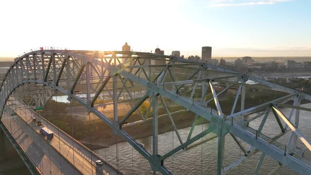 Memphis Tennessee skyline cityscape at dawn. Sunrise in morning. Hernando de Soto bridge over Mississippi River.