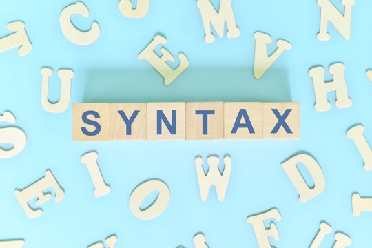 Study syntax in linguistics concept. Wooden blocks word typography flat lay in blue background.