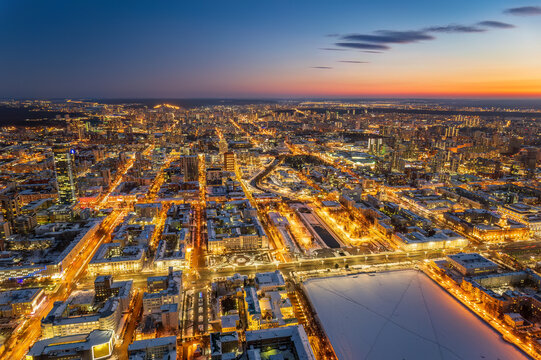 Embankment of the central pond and Plotinka in Yekaterinburg at winter sunset. The historic center of the city of Yekaterinburg, Russia, Aerial View