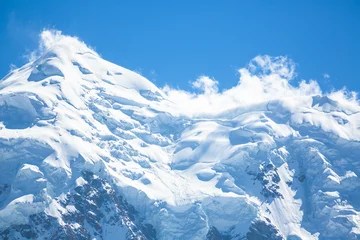 Zelfklevend Fotobehang Nanga Parbat Avalanche in Nanga Parbat is the ninth highest mountain in the world and western anchor of the Himalayas. Located in Pakistan, it is one of the 14 eight-thousanders, with a summit elevation of 8126 m.