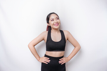 Shot of a sporty young confident woman posing against a white background.