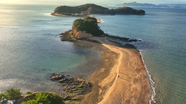 Romantic sandbar on the coast of Shodoshima island, flying over sandy beach, aerial view of Angel Road, Kagawa, Japan, Japanese tourist attraction, vacation in Japan