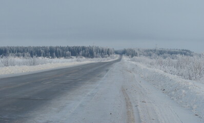 Winter highway on a frosty day. Western Siberia. Russia