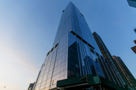 Spring, 2016 - New York, USA - Central Streets Of New York. Overall Plan. Tall Glass Skyscraper. Tall Office Business Building.