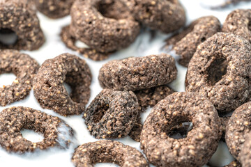 Chocolate flakes in milk in the form of rings close-up