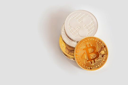 Mae Sot, Thailand- June 5, 2021:Pile of Bitcoin or coins of cryptocurrency symbol. Concept of blockchain system crisis.