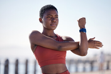 Fitness, exercise and black woman stretching in city for healthy lifestyle, wellness and cardio...
