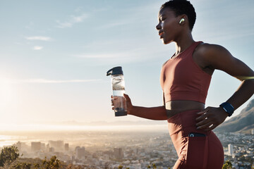 Black woman, water bottle or earphones in running workout goals, healthcare wellness training or...