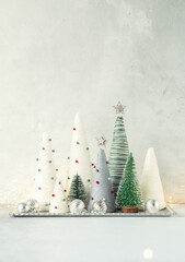 Handmade Christmas trees. Yarn wrapped cone trees. XMAS gifts. DIY concept