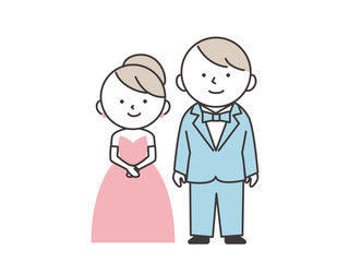 Fototapeta premium 結婚式の新郎新婦 並んで立っているタキシードを着た新郎とピンクのドレスを着た新婦