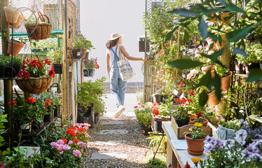Woman, walking or shopping in small business florist or green leaf plants, flowers or...
