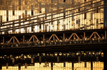 Manhattan Bridge and apartment building glass facade