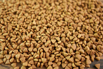 Dropped dry pet food, close-up. 