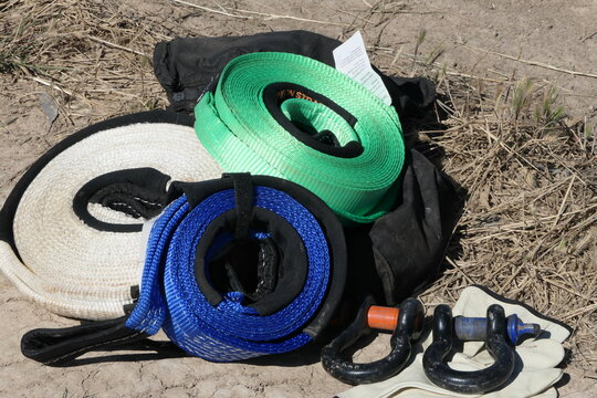 Vehicle recovery equipment when driving off road, tree trunk protector, winch extension strap, snatch strap, rated bow shackles and glove