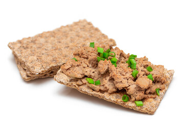 Crispy Sandwich with Chicken Pate and Green Onions Isolated on White Background - Top View. Whole Grain Bread with Liver Pate. Diet Breakfast and Healthy Food
