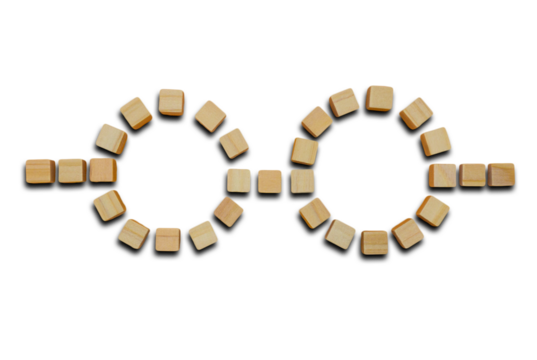 眼鏡の形に並べたナチュラルなウッドキューブの素材 - Powered by Adobe