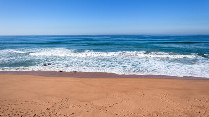 Fototapeta na wymiar Beach Sand Ocean Blue Horizon Water Wave Landscape