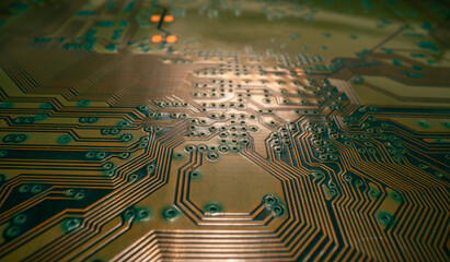 Circuit board. Technological electronic plate with roads and other components, selective focus. Technology background, electronics texture.