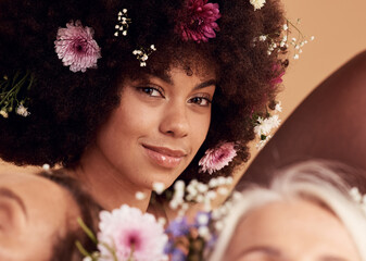 Black woman, flowers and smile for beauty portrait in studio for skincare wellness, luxury makeup...