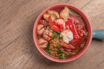 Red Sauce Noodle Soup called Yentafo Noodle, a popular Thai dish.