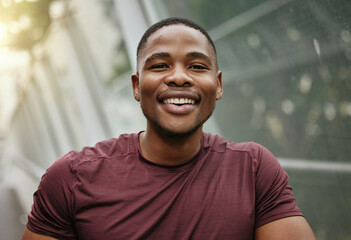 Fitness, running and smile with portrait of black man on bridge for training, health and workout. Sports, endurance and stamina with face of runner in city for exercise, cardio and challenge goals