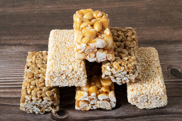 A pyramid of kozinak of different flavors. Traditional sweetness of georgia from seeds and nuts...