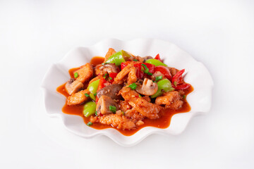 chicken meat with vegetables and mushrooms on a white background