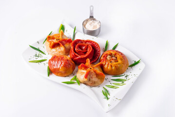 fried manti with sour cream on a white background